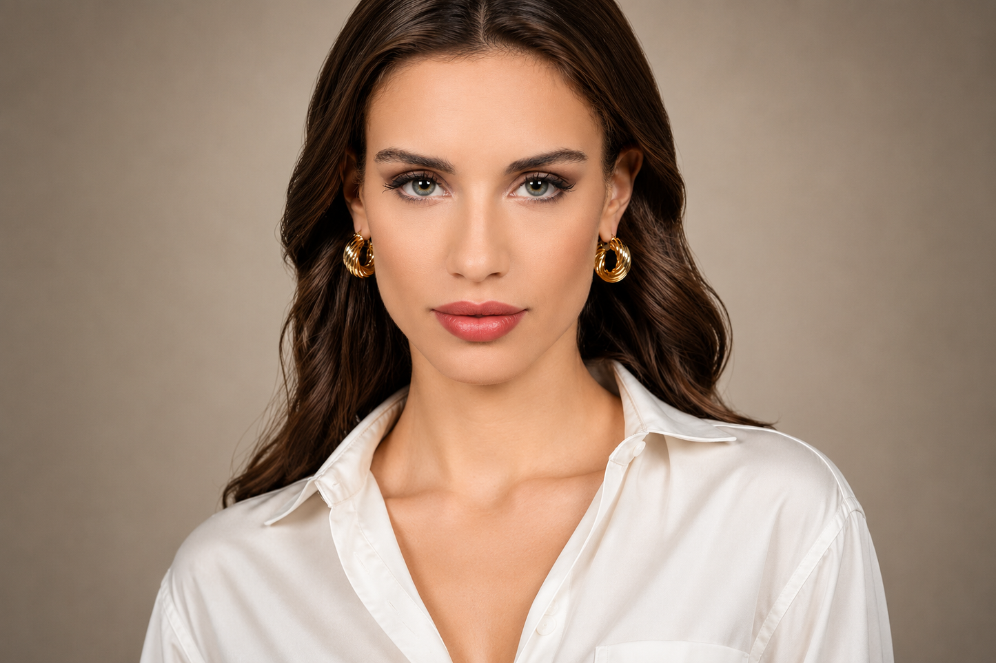 25mm 18kt Yellow Gold Bonded Twisted Hoop Earrings by UNOAERRE