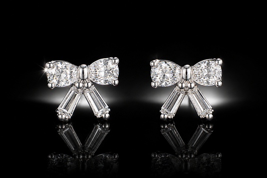 .50 ctw Genuine Diamond Crystalline Platinum Finished Baguette Bow Stud Earrings by Anna Zuckerman