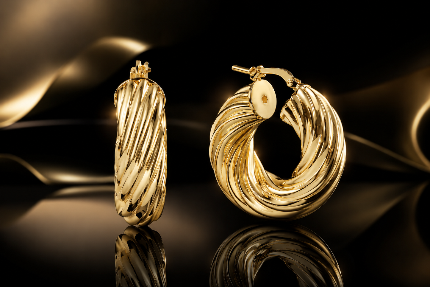 25mm 18kt Yellow Gold Bonded Twisted Hoop Earrings by UNOAERRE